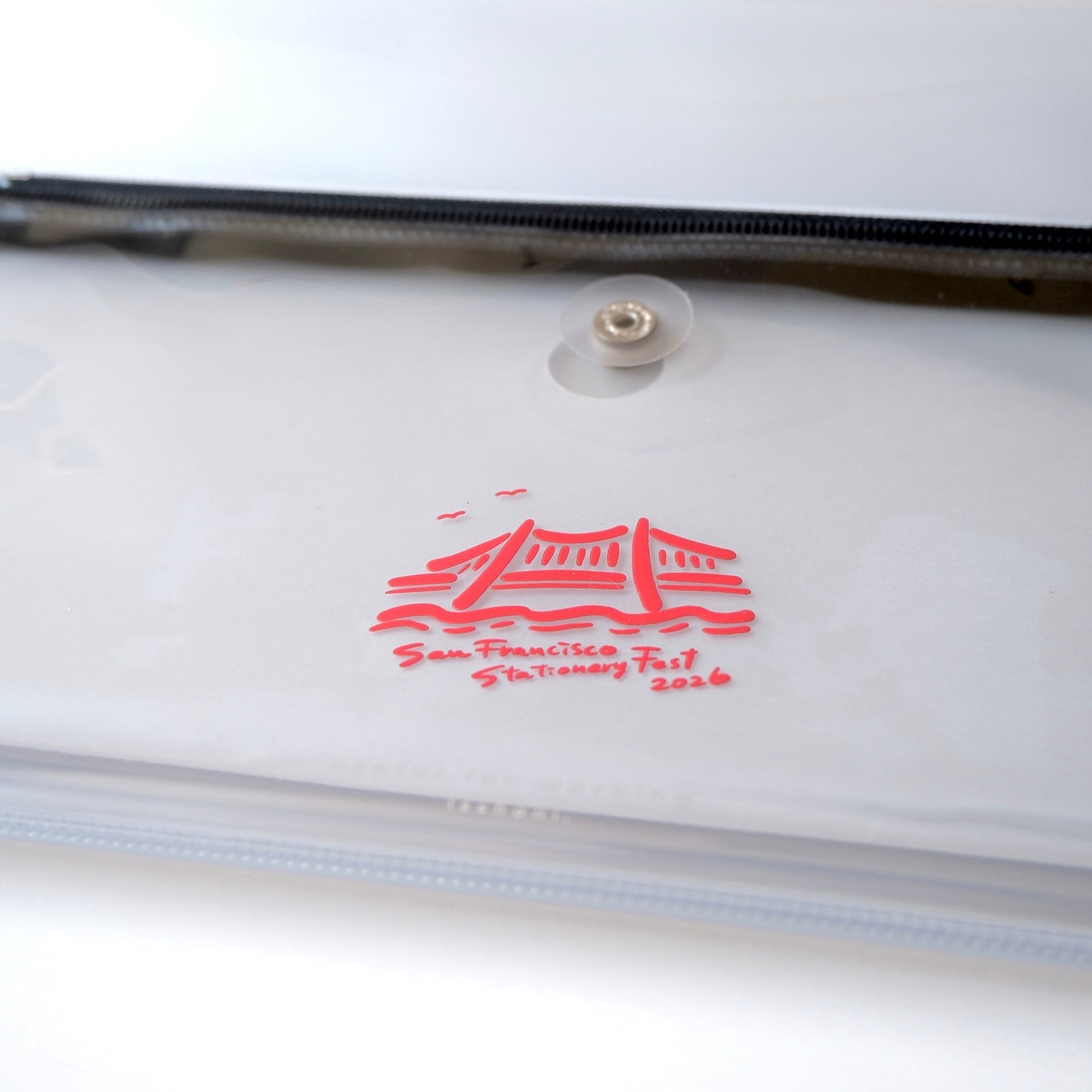 Clear case with sf stationery logo closeup
