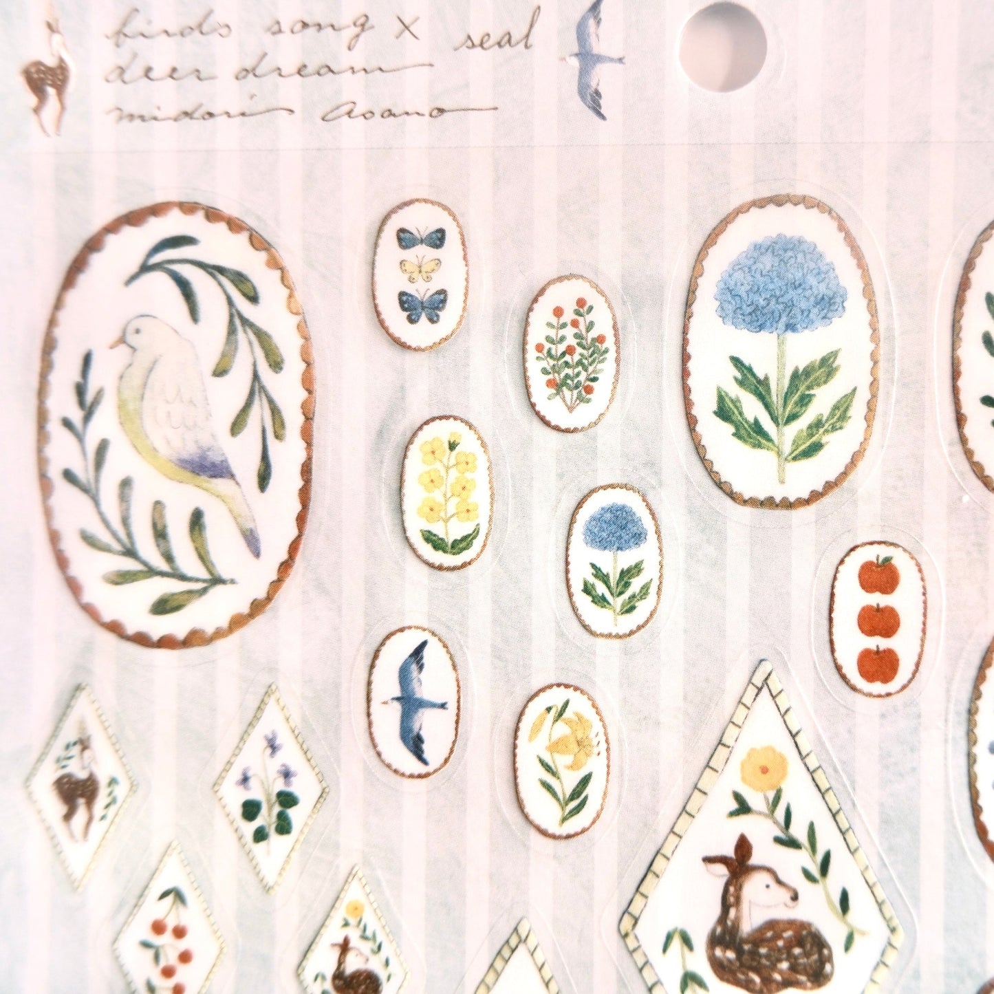 closeup of cozyca sticker pet birds and deer