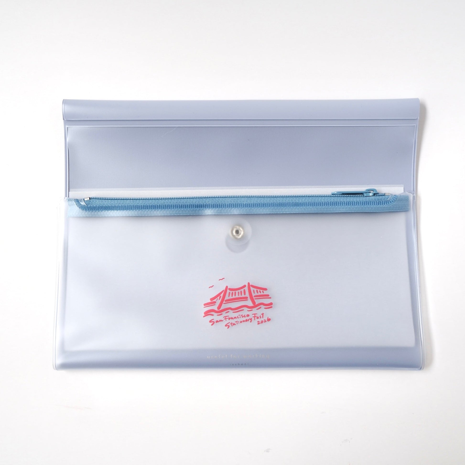 Clear pouch with a blue zipper and red logo on a white background