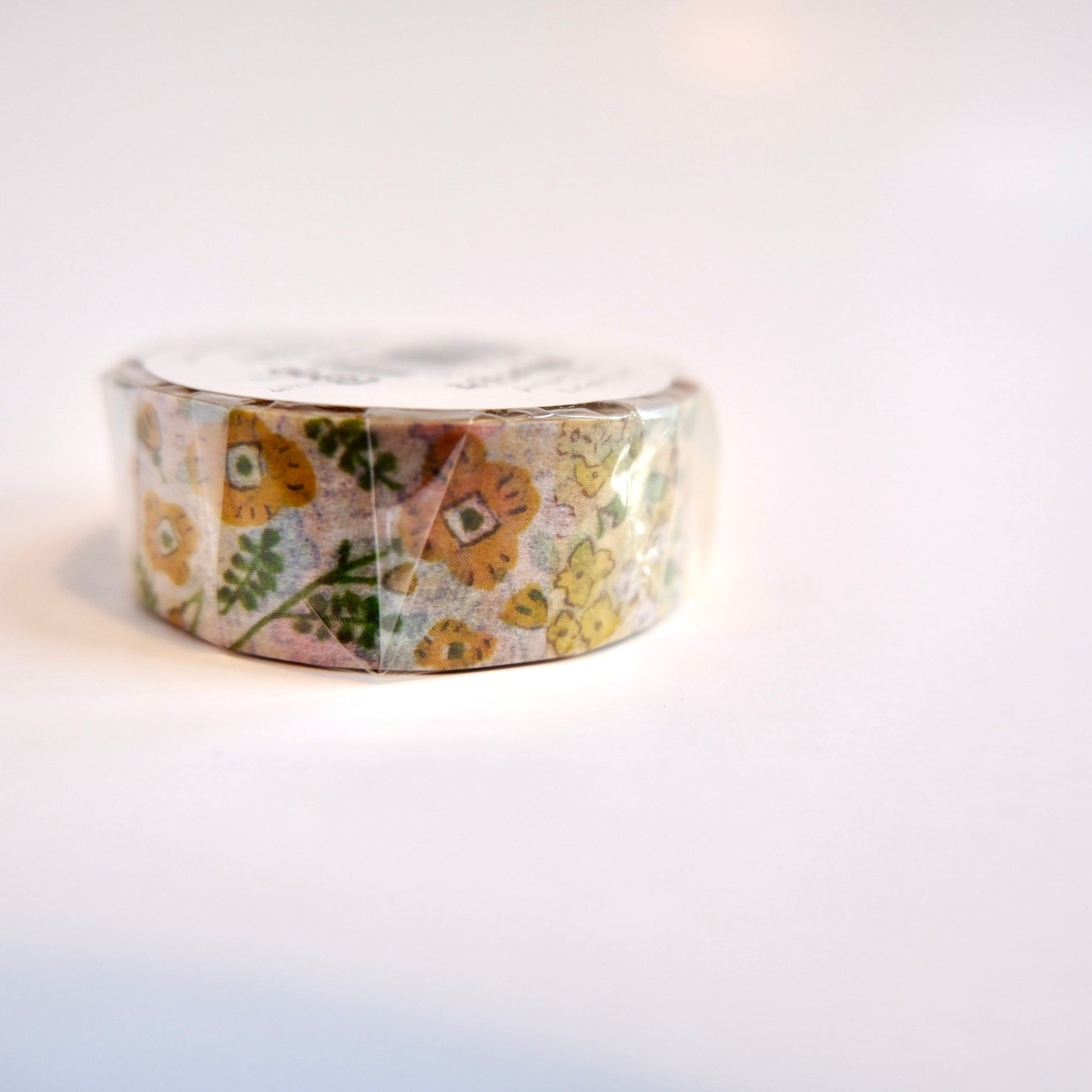 Close-up of Furukawa Shiko washi tape showing detailed yellow flower pattern inspired by everyday Japanese life.