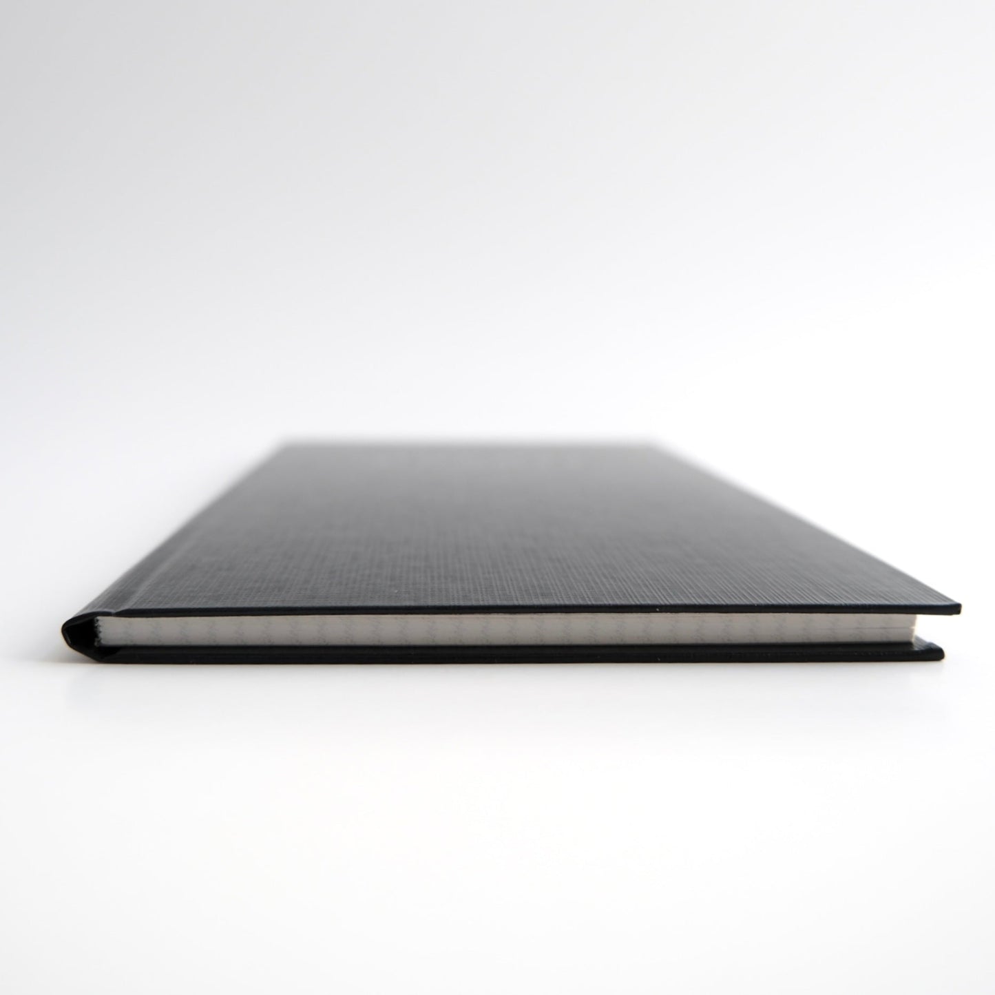 KOKUYO Field Sketch Book with 3mm graph paper and Uni Jetstream ballpoint pen, premium Japanese stationery for journaling. Compact size for carrying in a pocket or bag.