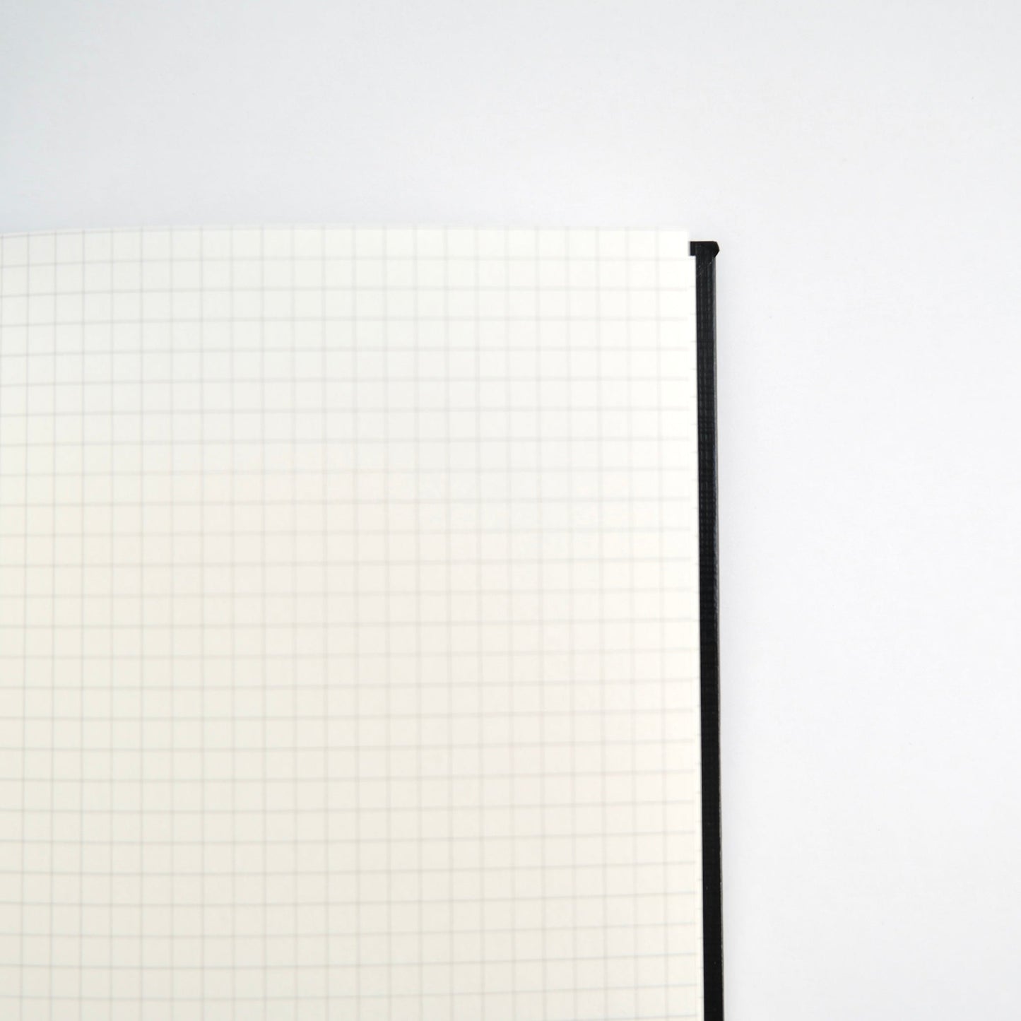 KOKUYO Field Sketch Book with 3mm graph grid in charcoal black, fountain pen friendly paper made in Japan.Light gray 3 mm graph layout.
