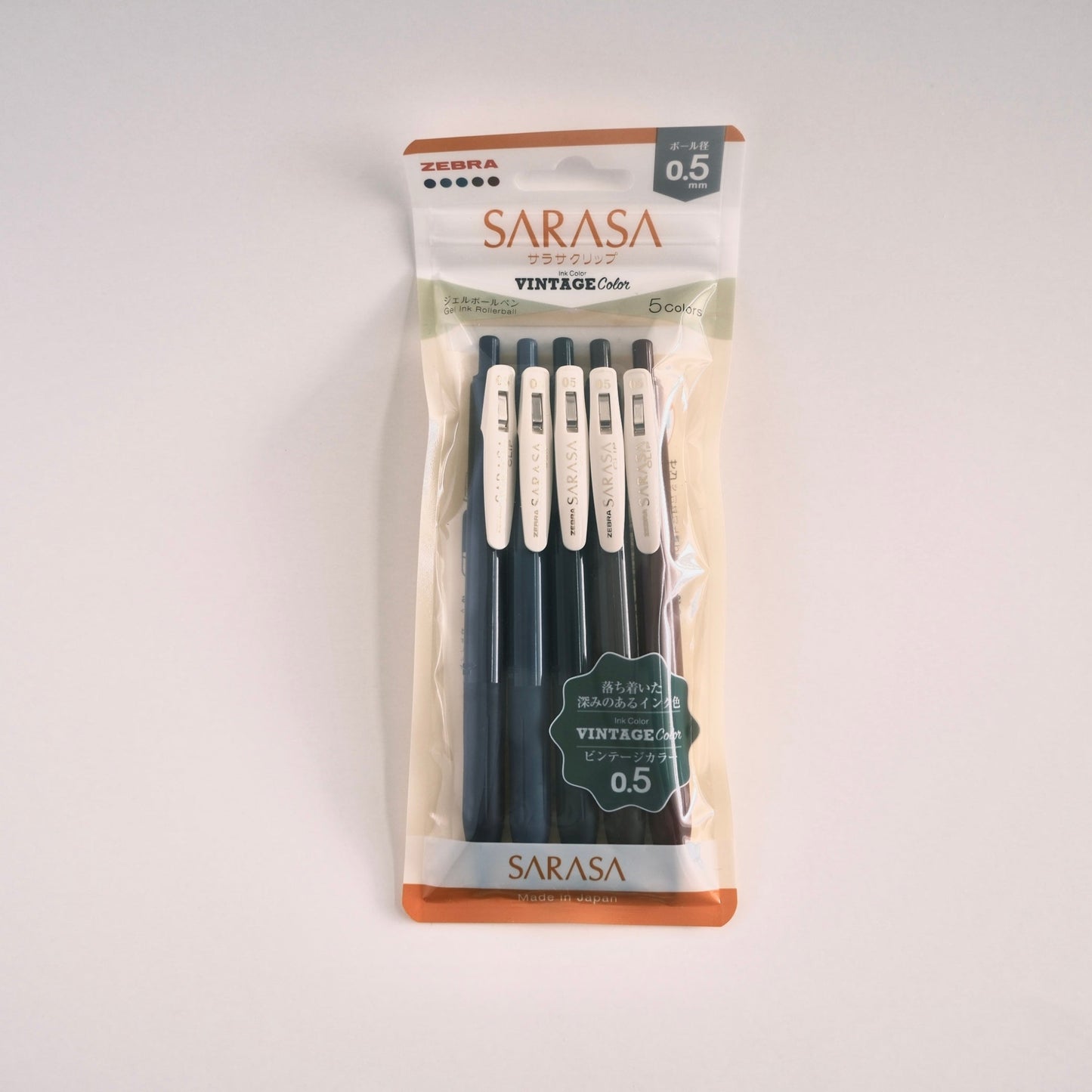 Pack of Sarasa gel pens with packaging on a light gray background